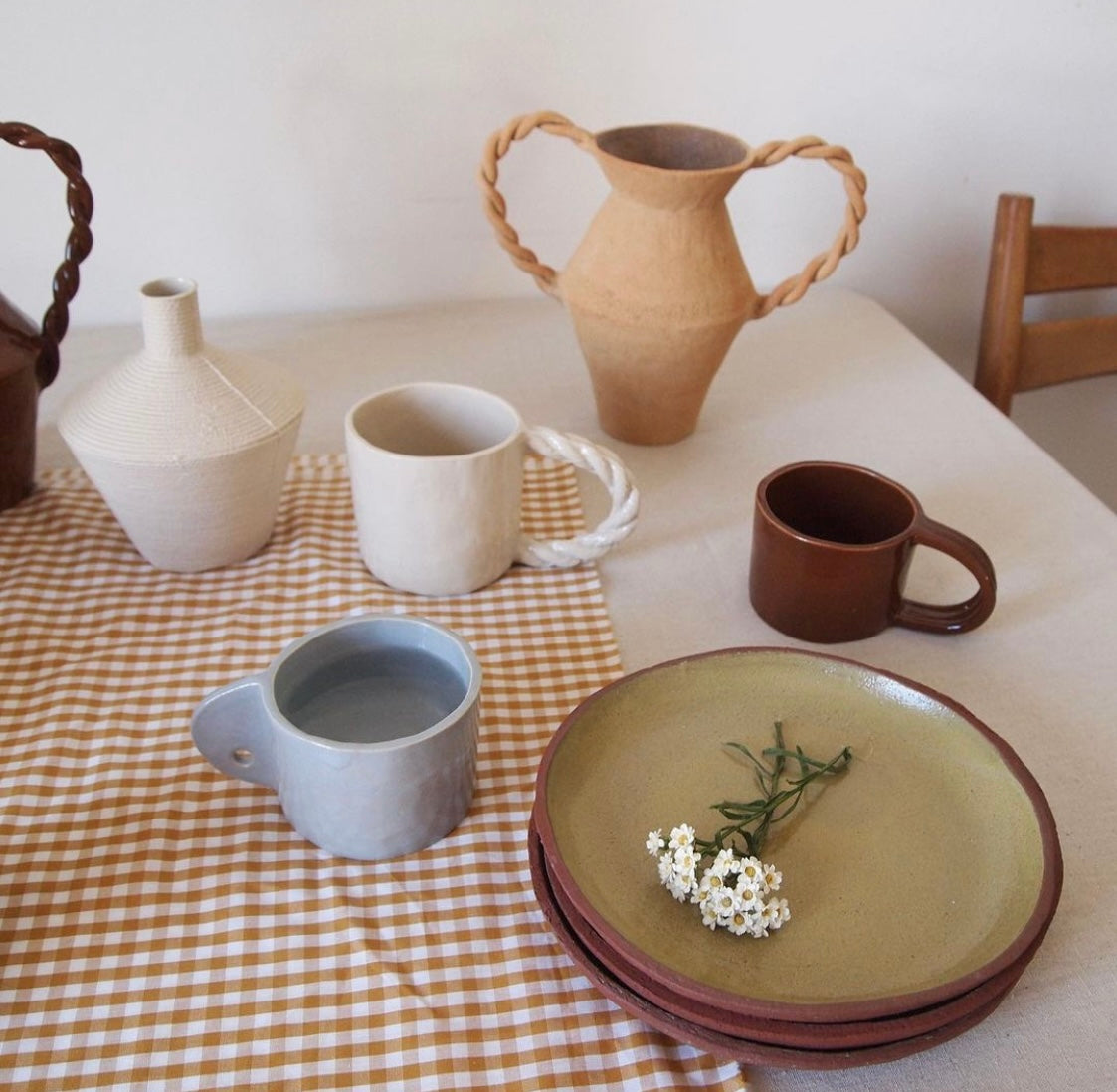Small cup with rope handle