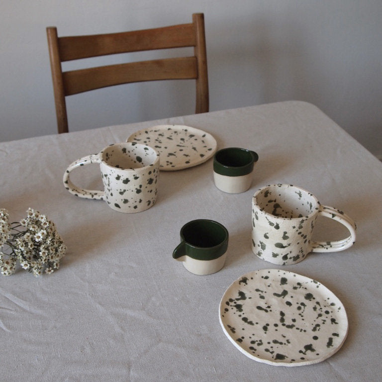 Green speckled handle cup