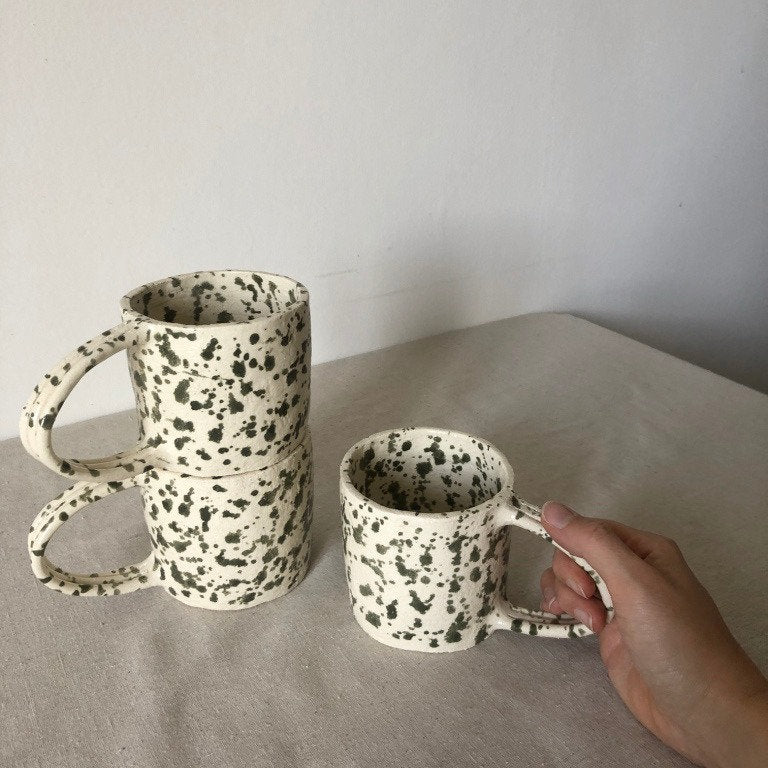 Green speckled handle cup