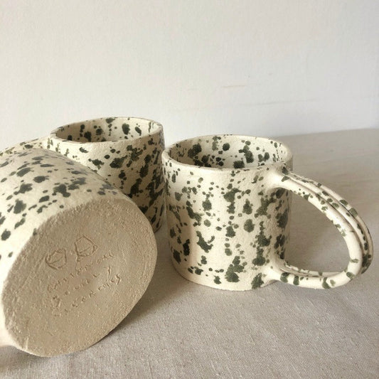 Green speckled handle cup