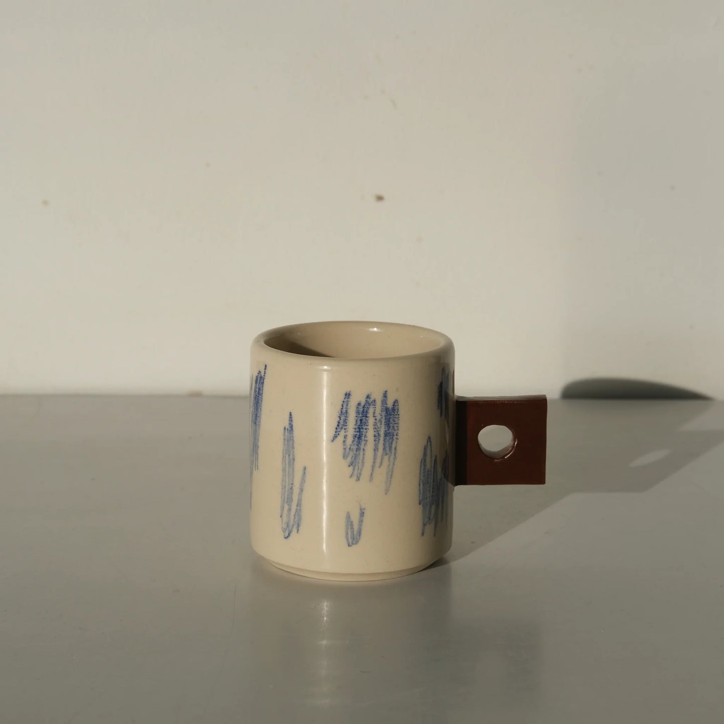 Scratched cup